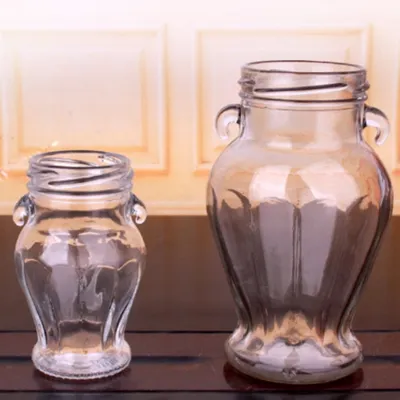 Estilos de botellas de vidrio para almacenar alimentos disponibles