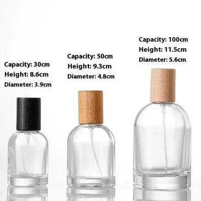 Botellas de perfume cilíndricos de vidrio con pulverizador de niebla fina (30ml / 50ml / 100ml)